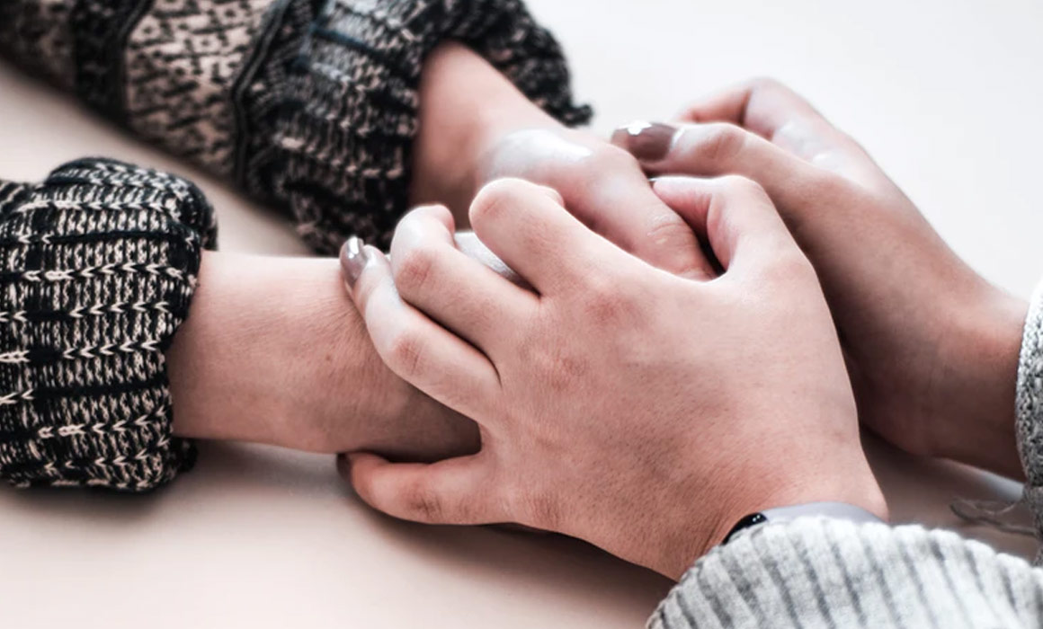 Hands holding hands