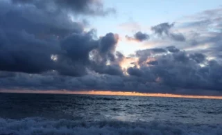 grey clouds over a grey sea
