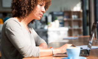 Woman sitting at her laptop.