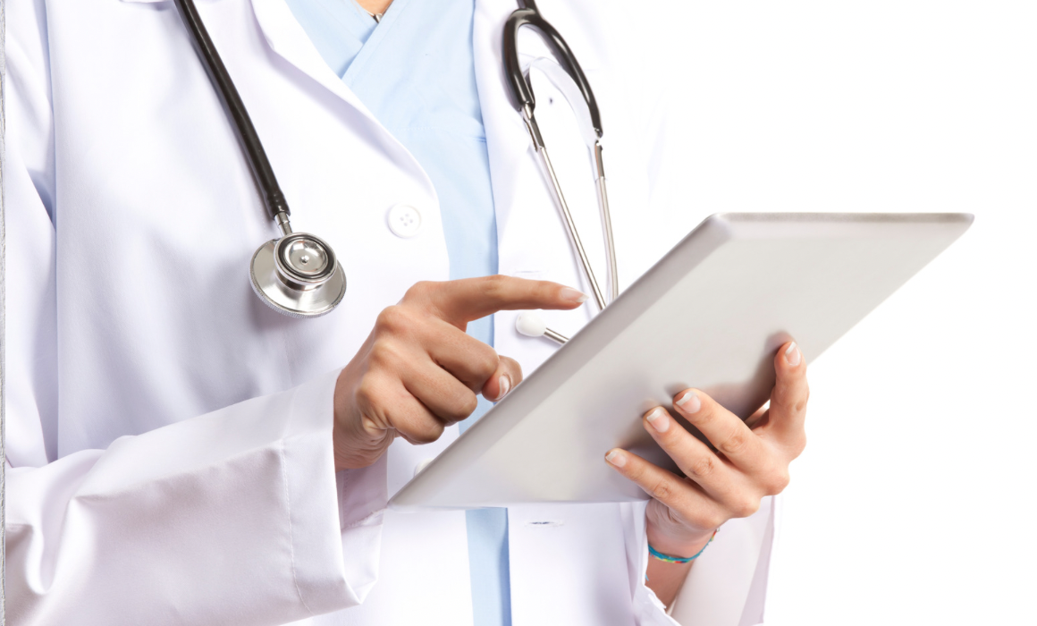 A doctor holding a clipboard with a stethoscope.